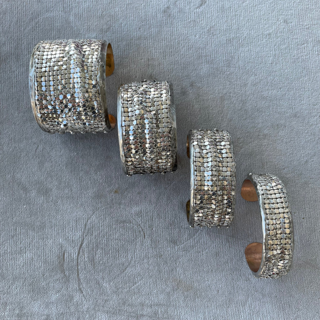 large brass cuff with gold plated brass mesh